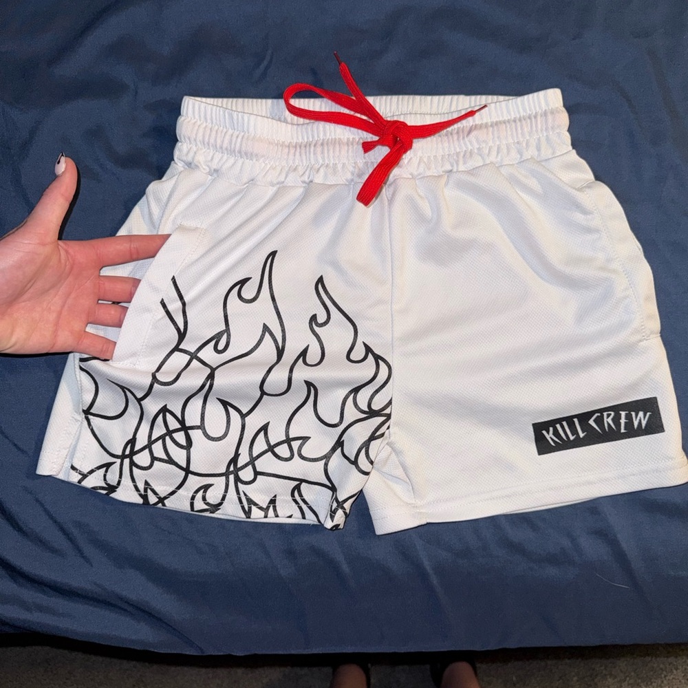 Kill Crew White Shorts with Black Flame Graphic and Red Drawstring